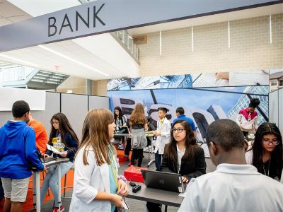 Students at a bank in a JA Finance Park or JA Biztown