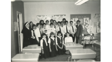 Logo for Students Gather After Participating in Project Business